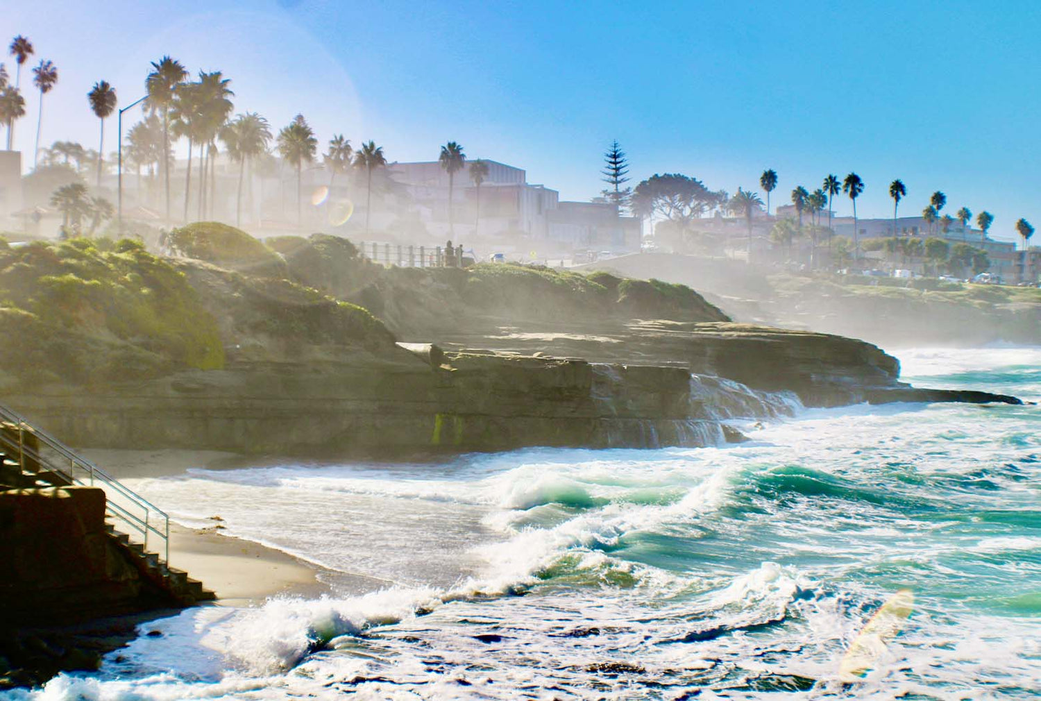 Waves crashing at high tide along the coast of La Jolla.