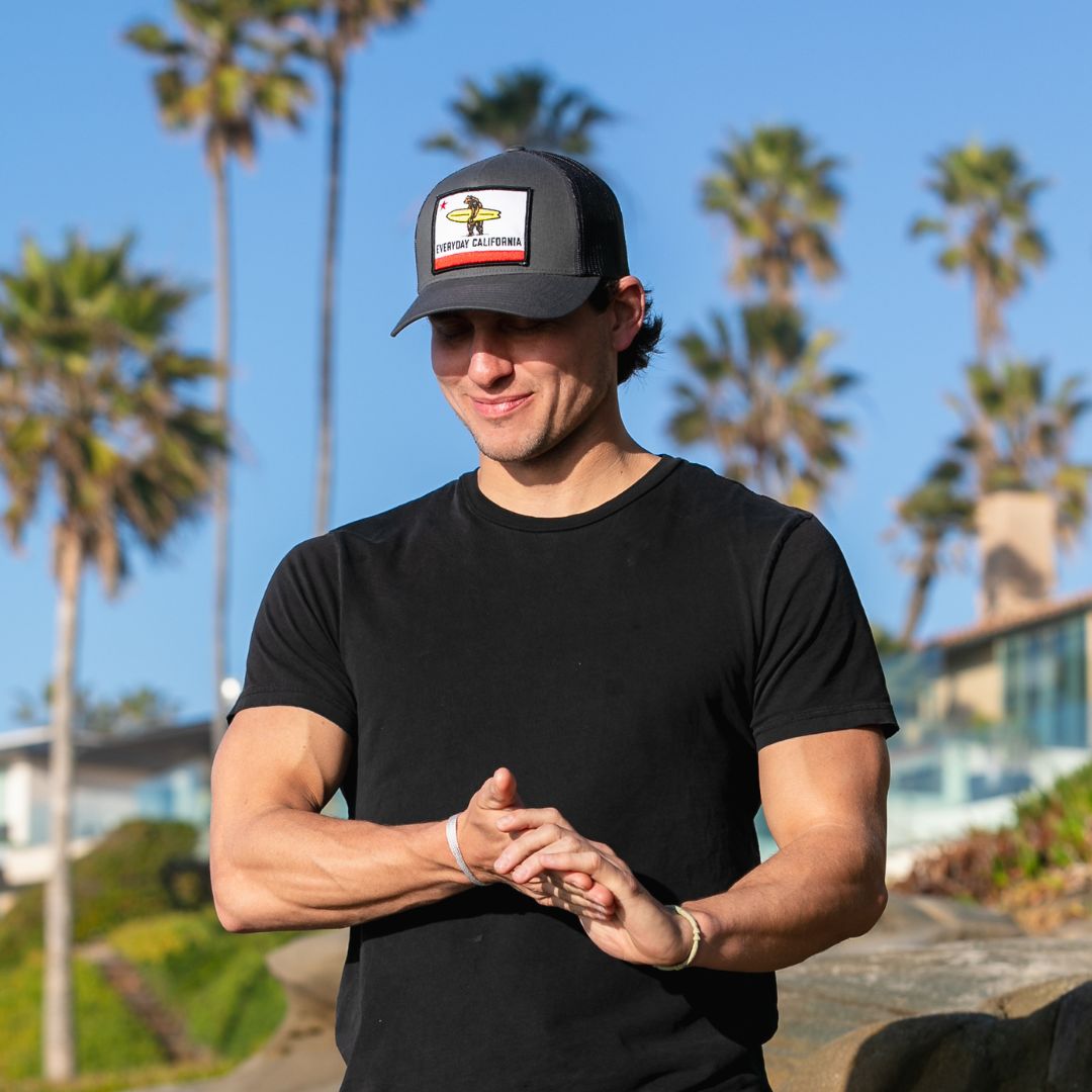 Charcoal Shores Hat from everyday California on a sunny beach day in San Diego 
