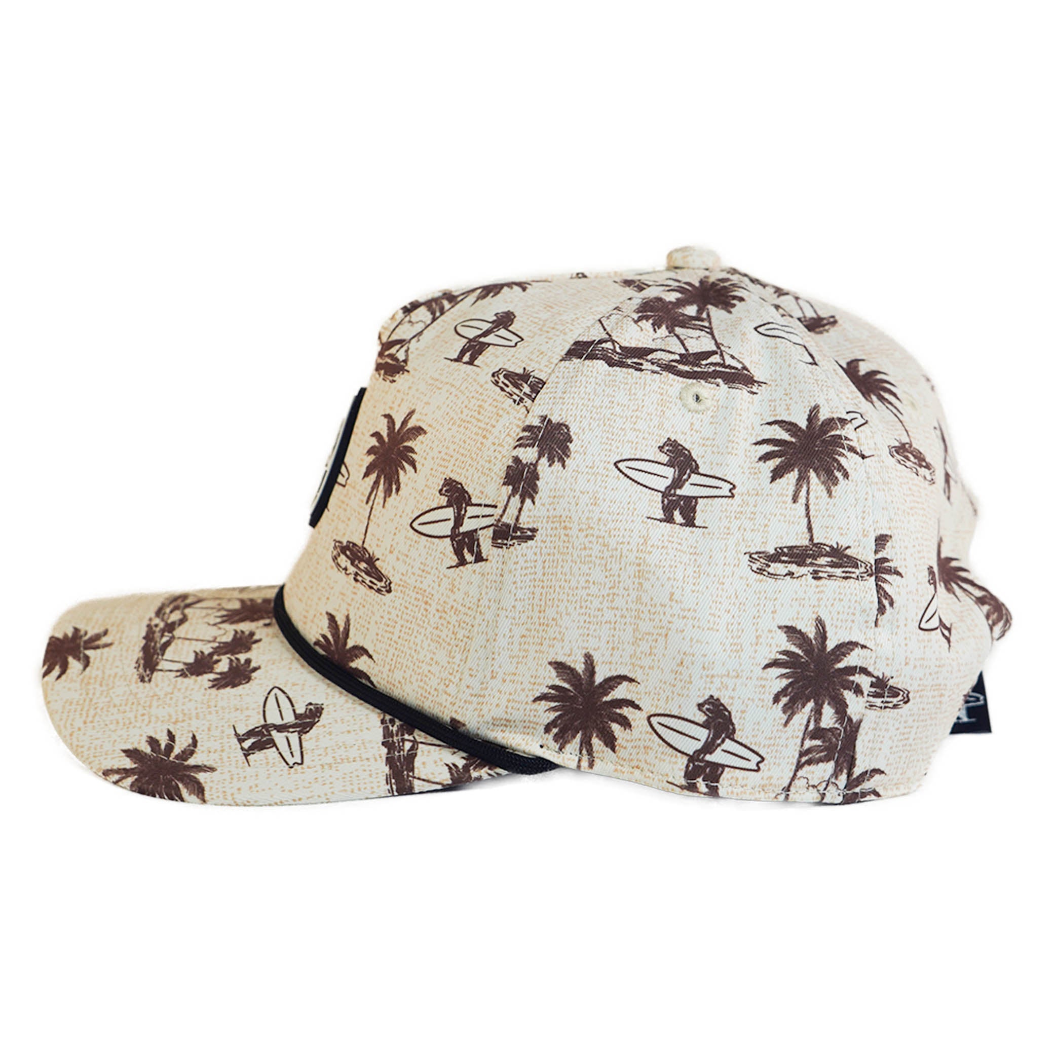 Cap with palm tree and beach hut pattern on a white background