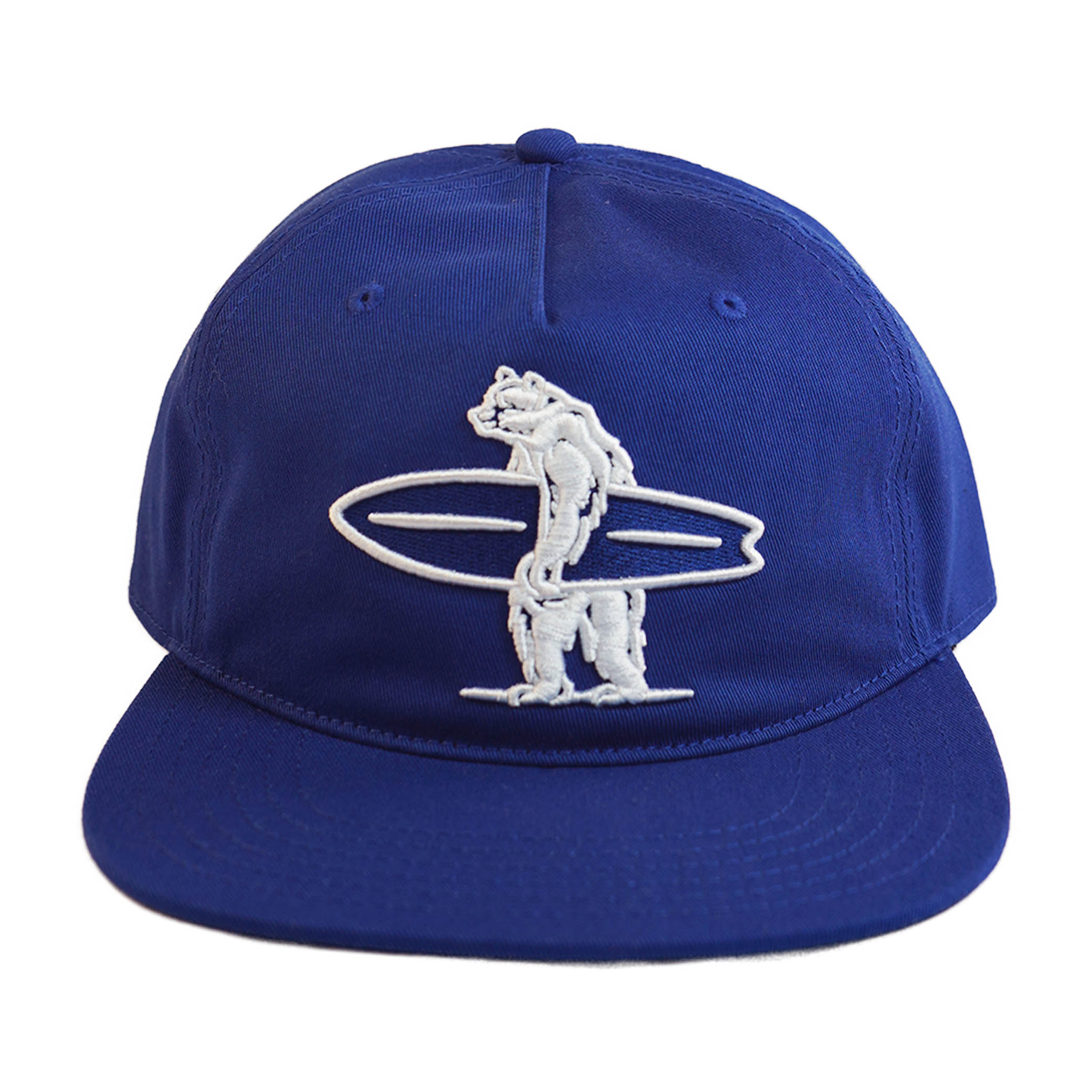 Blue cap with embroidered white bear holding a surfboard on the front.