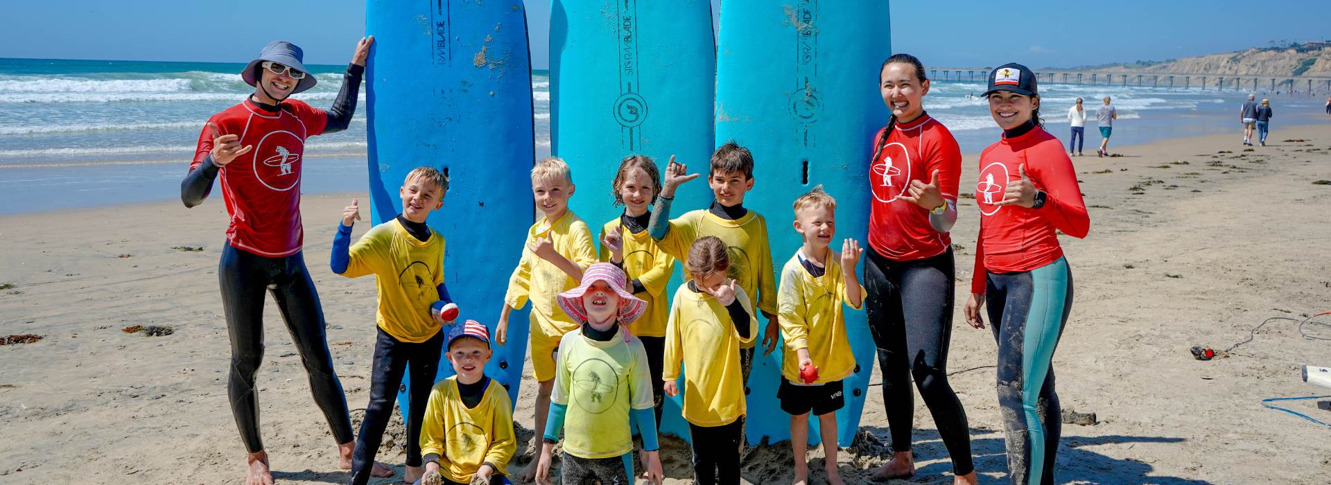 Everyday California Kid's Summer Surf Camp group after their surf session with big smiles and new skills