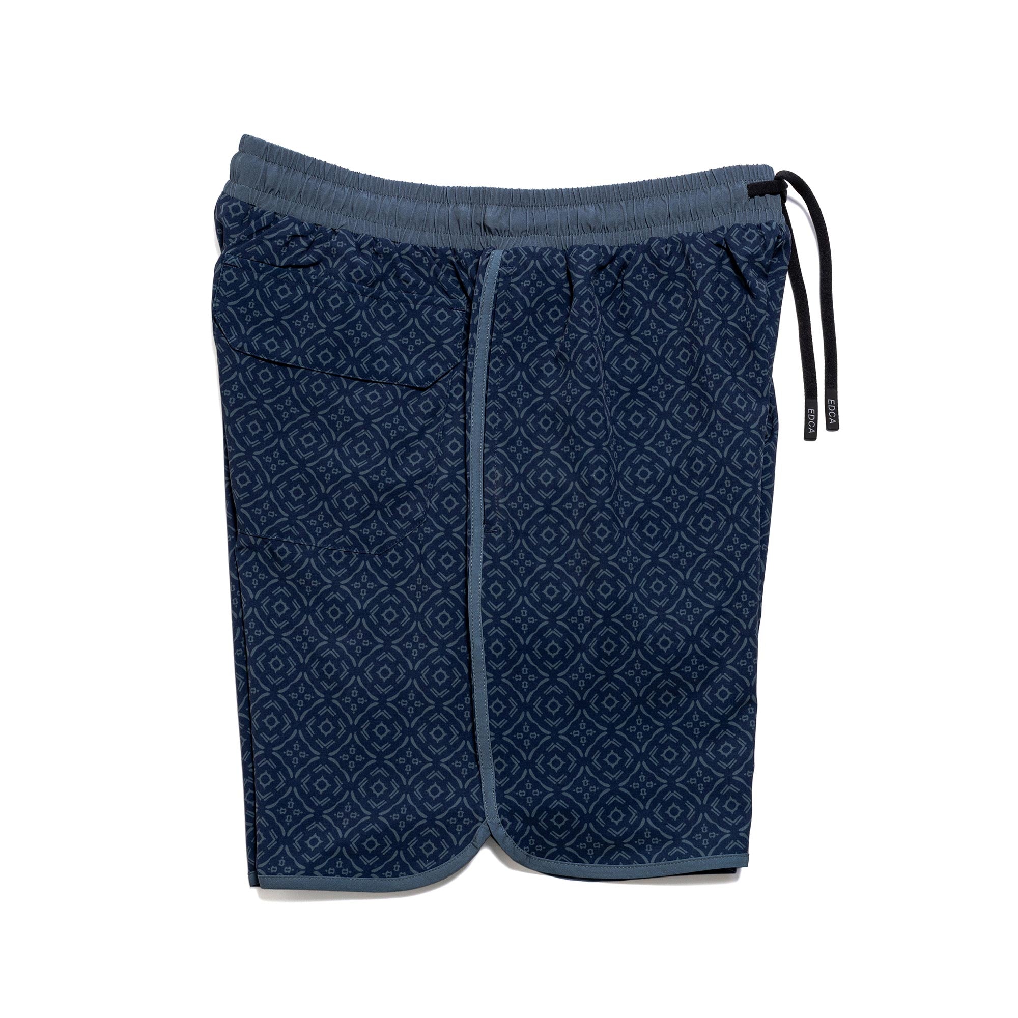 Everyday California navy blue patterned boardshorts with a brand logo on a white background