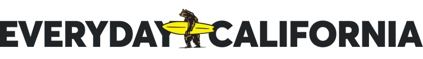 Everyday California logo featuring a bear holding a yellow surfboard, positioned in between the words "EVERYDAY" and "CALIFORNIA".