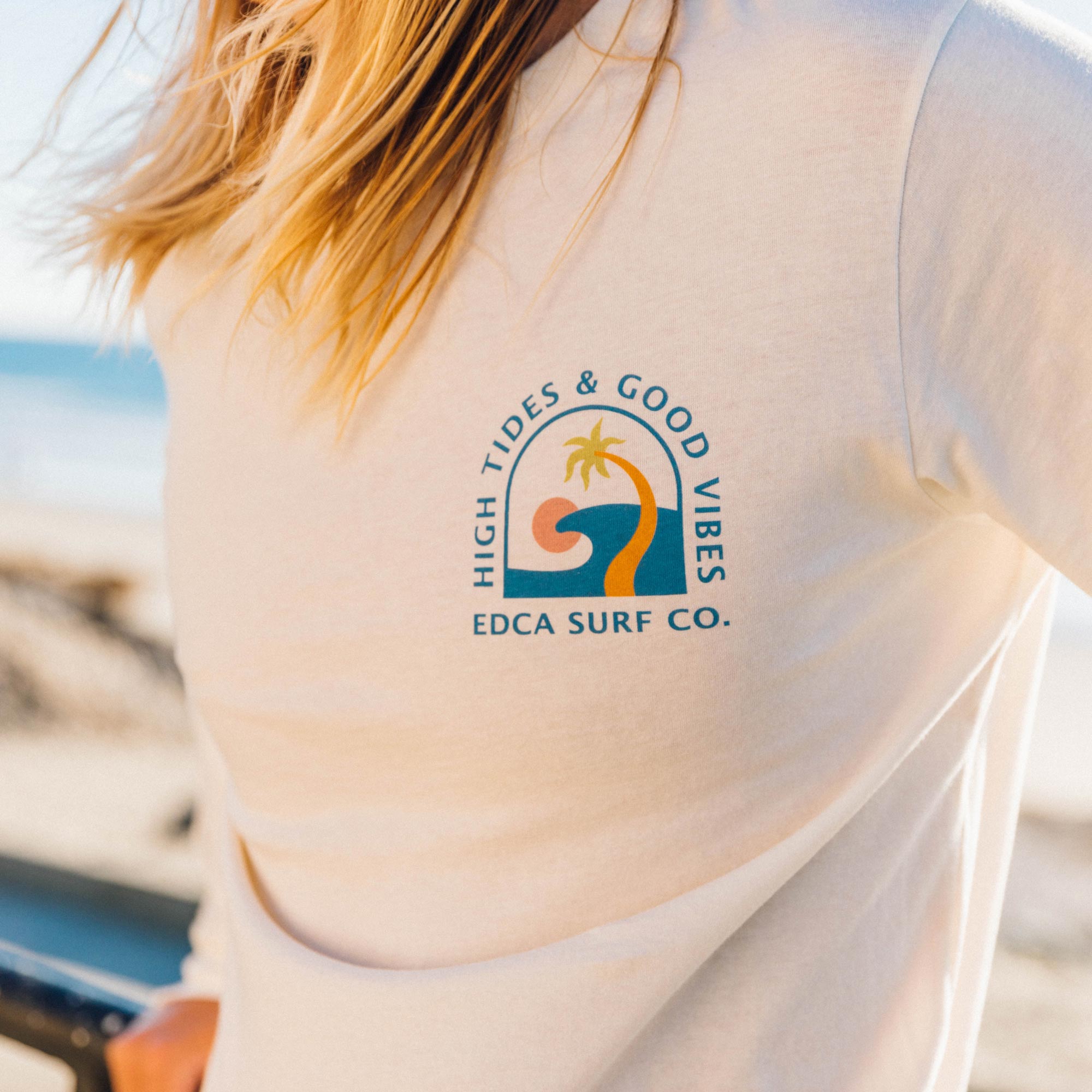 Front side, with "High tides and good vibes" pictured in top right.