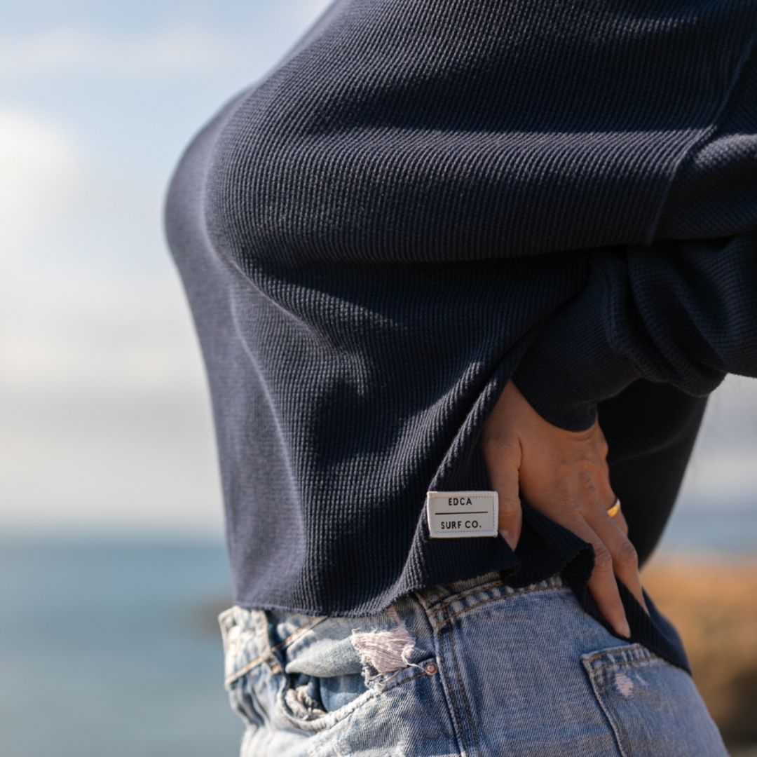 the Sophie waffle knit long sleeve looking out over the water of California