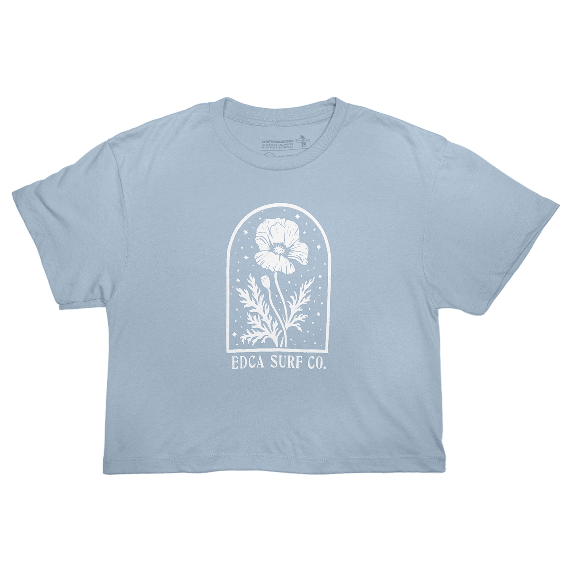 Light blue t-shirt with white floral design and 'EDCA Surf Co.' text on a white background