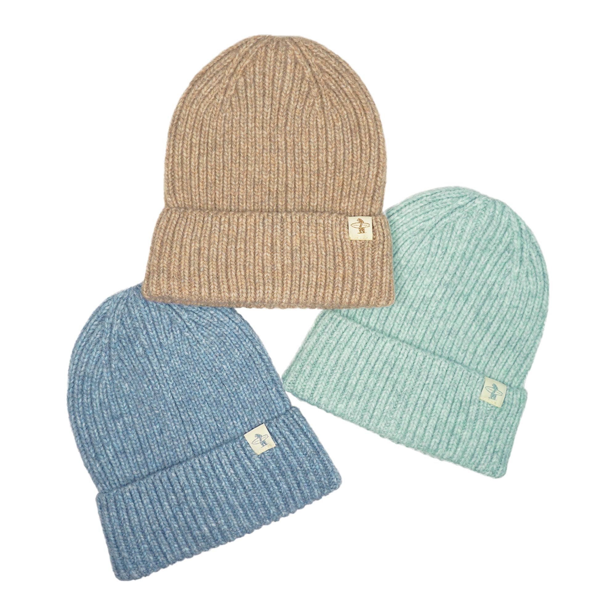 Three Everyday California knit beanie hats in beige, blue, and seafoam green on a white background