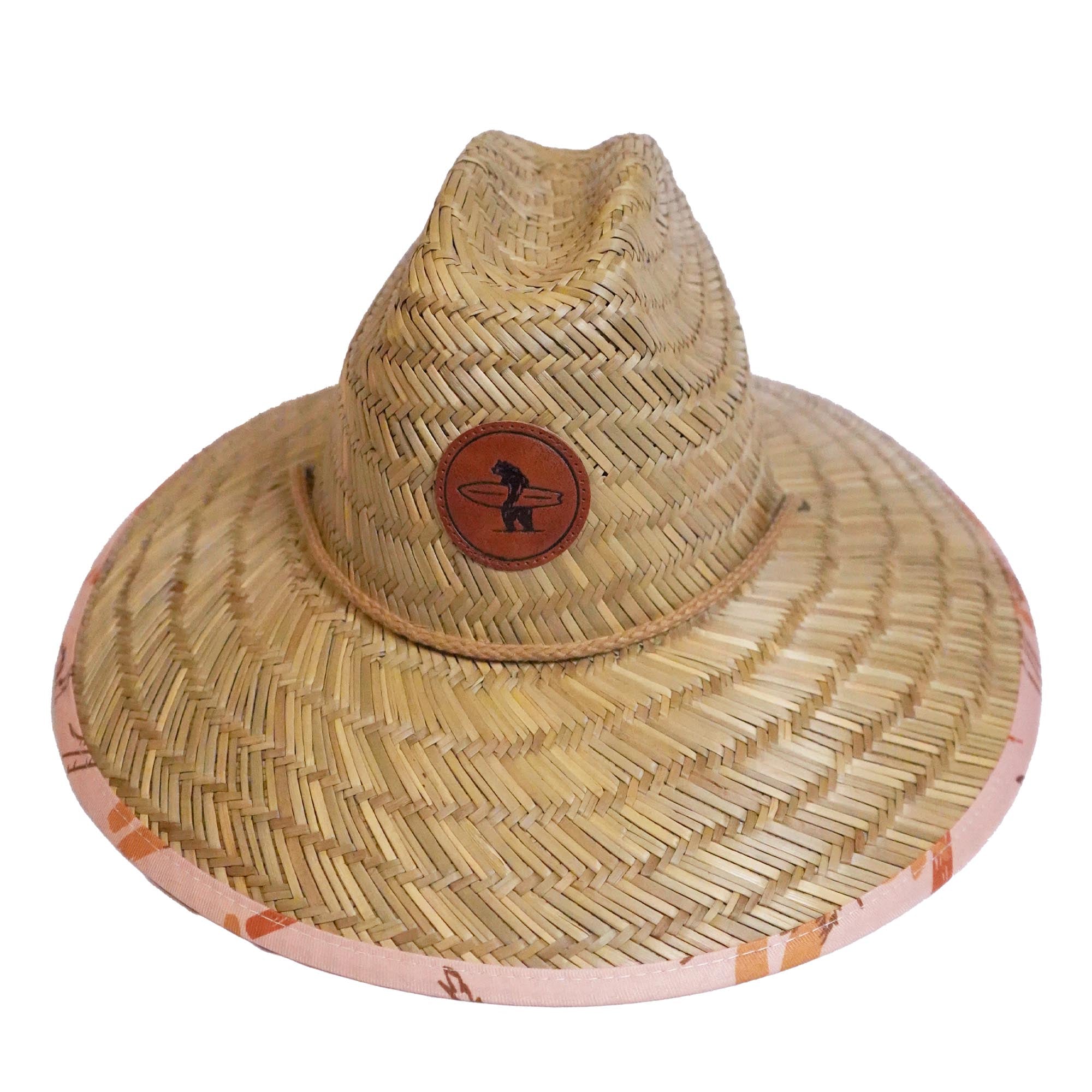 A beige Eddie Straw Hat with a wide brim and a logo patch on the crown, featuring a natural straw weave and an adjustable chin strap.