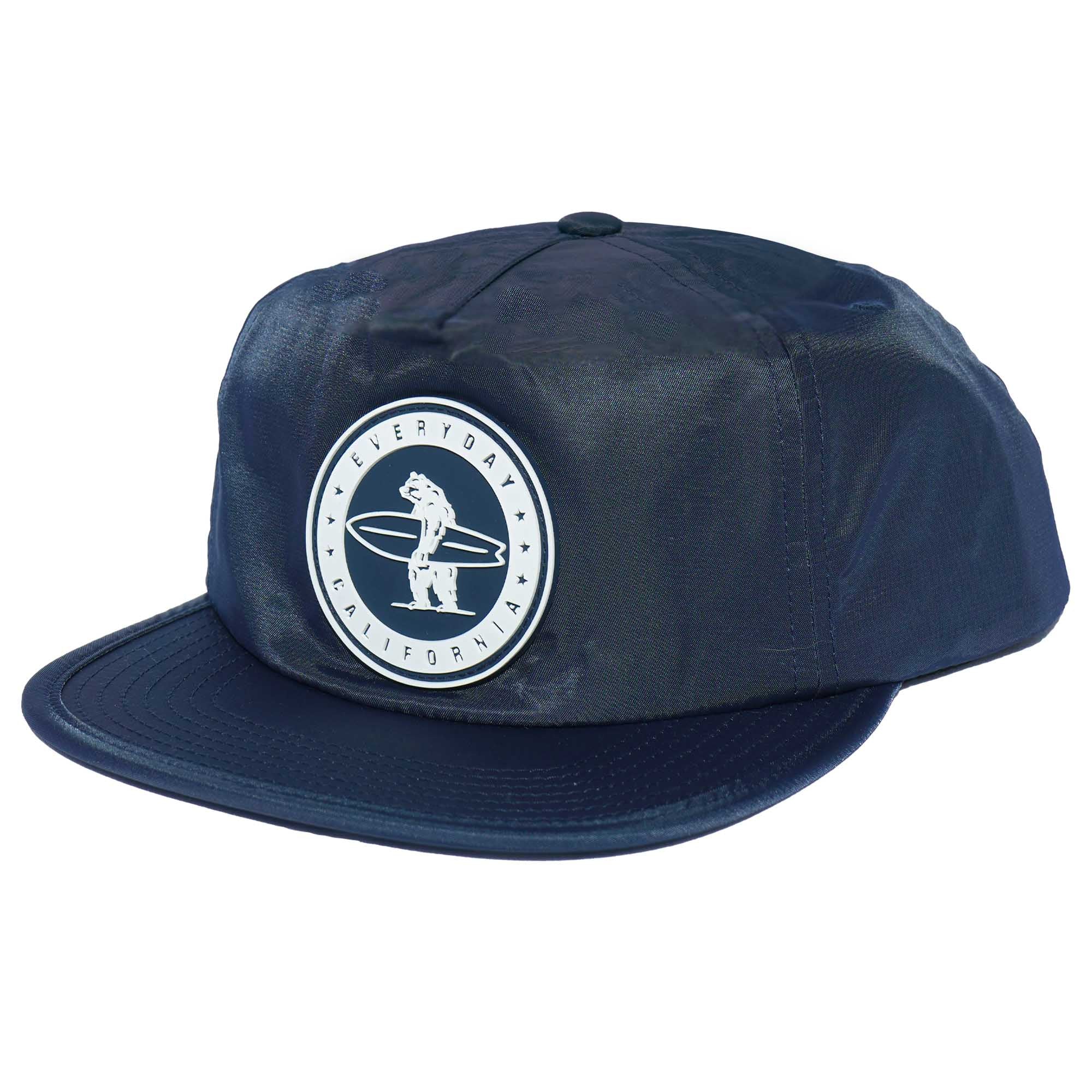 Green snapback hat with a logo patch on the front.