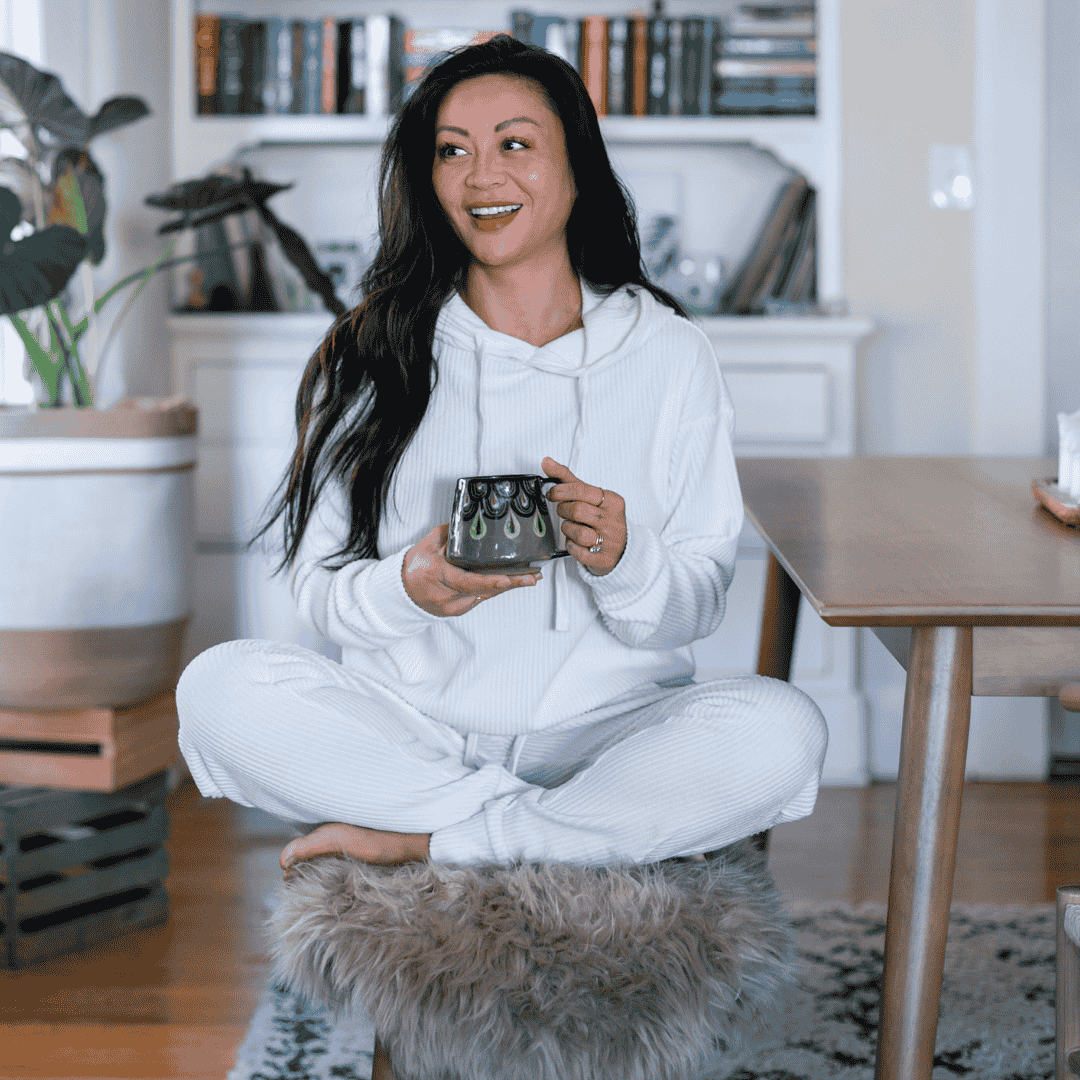 Malibu hoodie and jogger set in the color off-white, featuring 4x4 ribbed cotton fabric worn on a size small model.