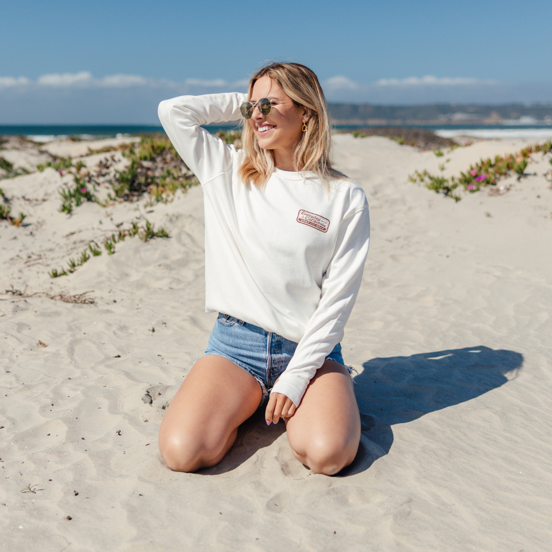 Everyday California Surf Shop Crewneck on Kate in Coronado Island in San Diego, California