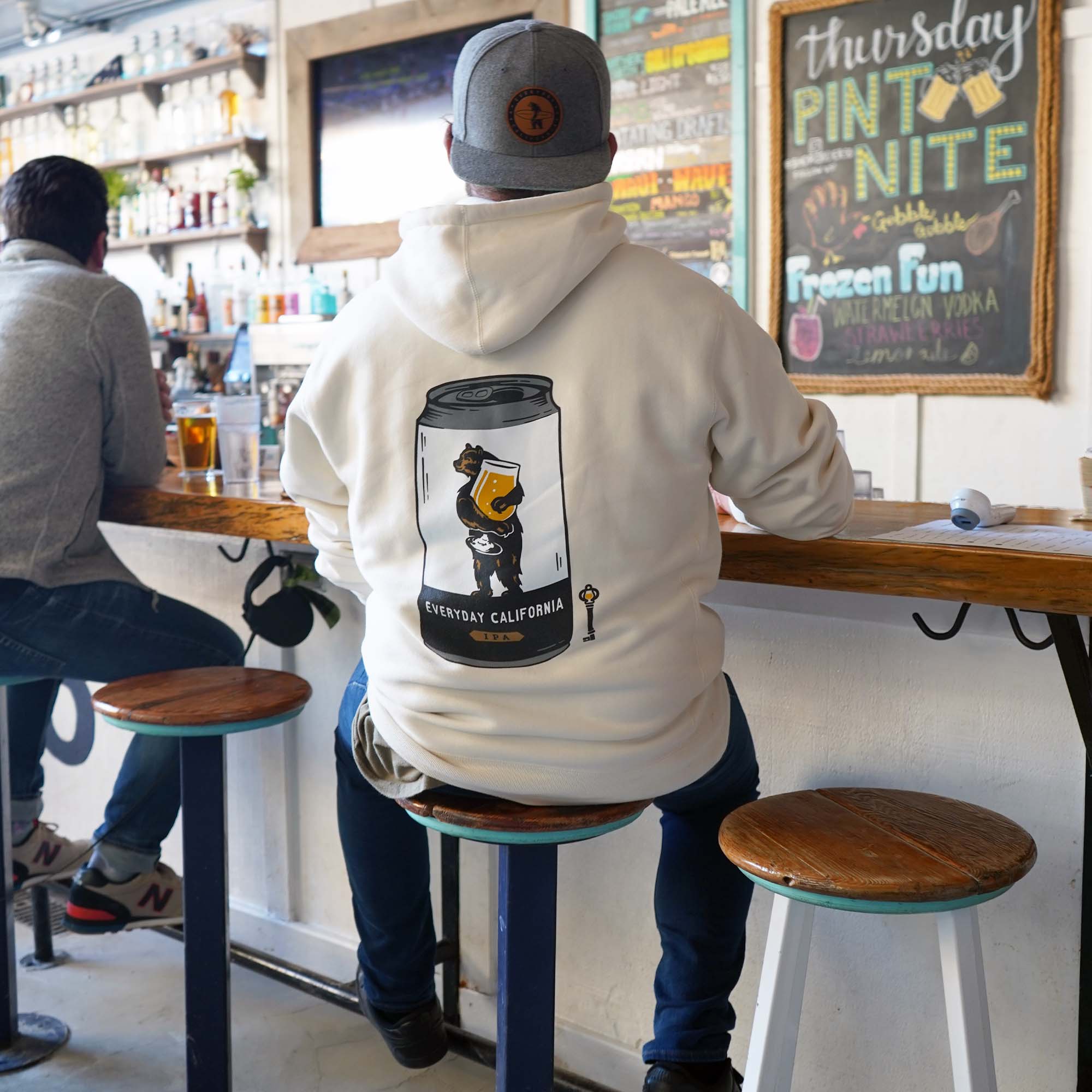 Everyday California Brewmaster Hoodie - thick cream hoodie with Brutus the Bear logo holding a beer