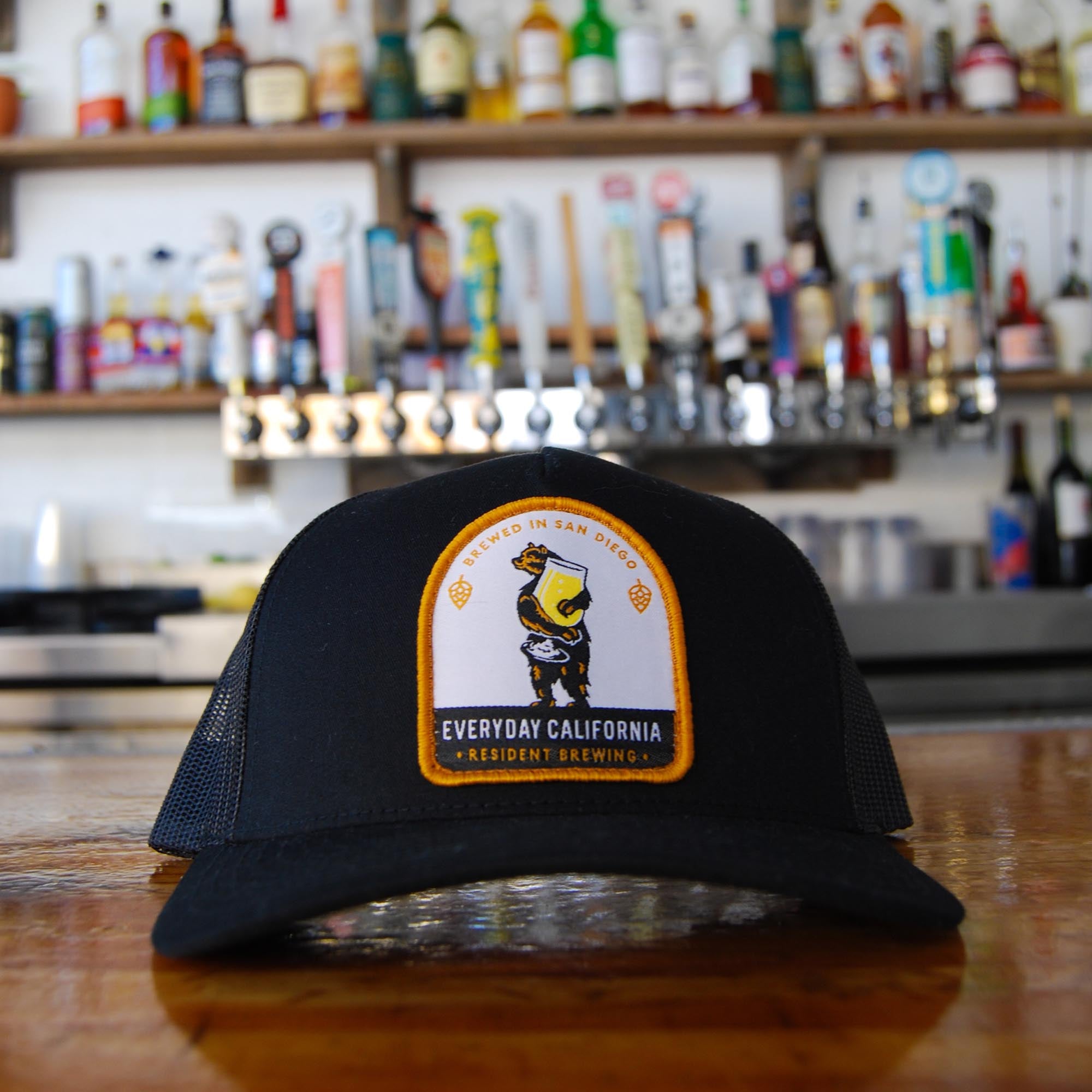 Everyday California Brewski Trucker Hat in Black on bar