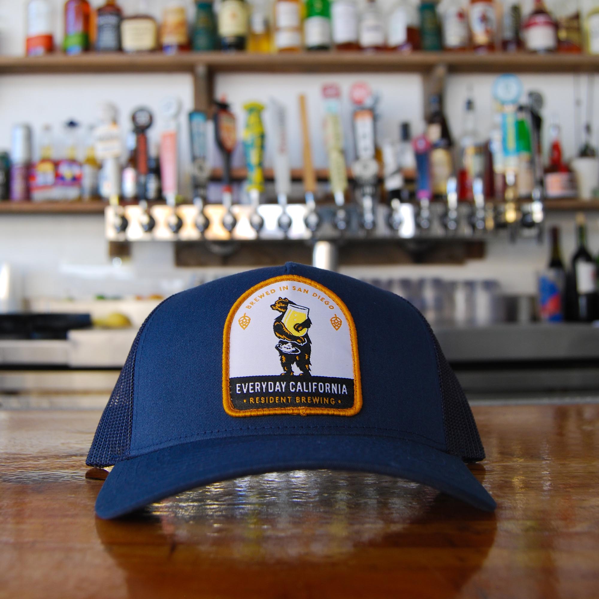 Everyday California Brewski Trucker Hat in Navy on bar