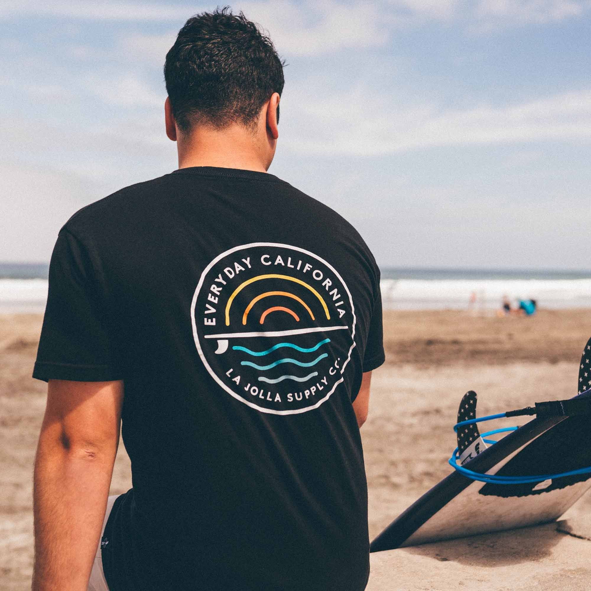 Everyday California’s best selling Cabrillo tee. Pretend that summer never has to end with this relaxed fit tee. Sun, surf and sea graphic on the front and back.