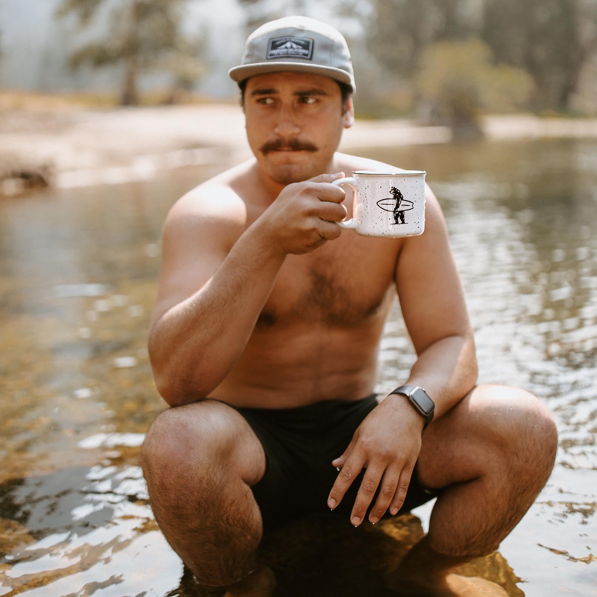 Everyday California Campfire Mug - High-quality ceramic, speckled off-white mug with Everyday California Camping Logo on one side and Brutus the Bear on the other side.