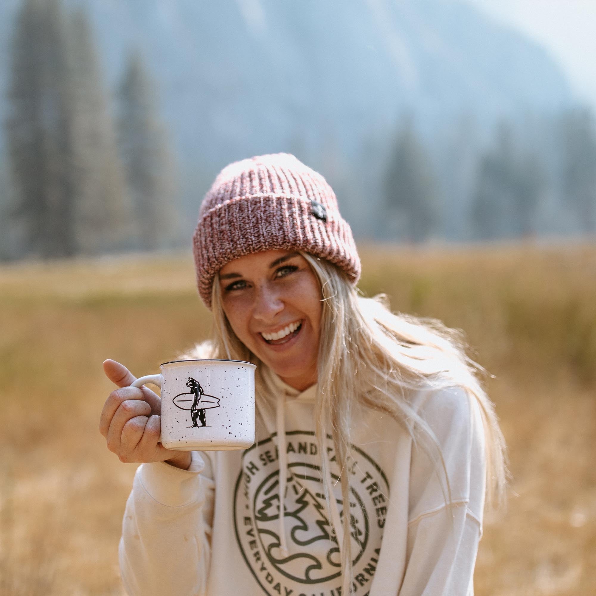 Everyday California Campfire Mug -  High-quality ceramic, speckled off-white mug with Everyday California Camping Logo on one side and Brutus the Bear on the other side. 