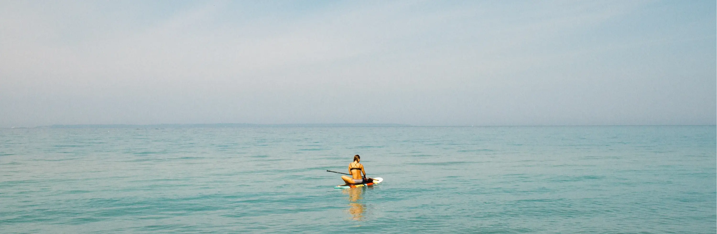 How to Get on A Paddleboard After Falling?