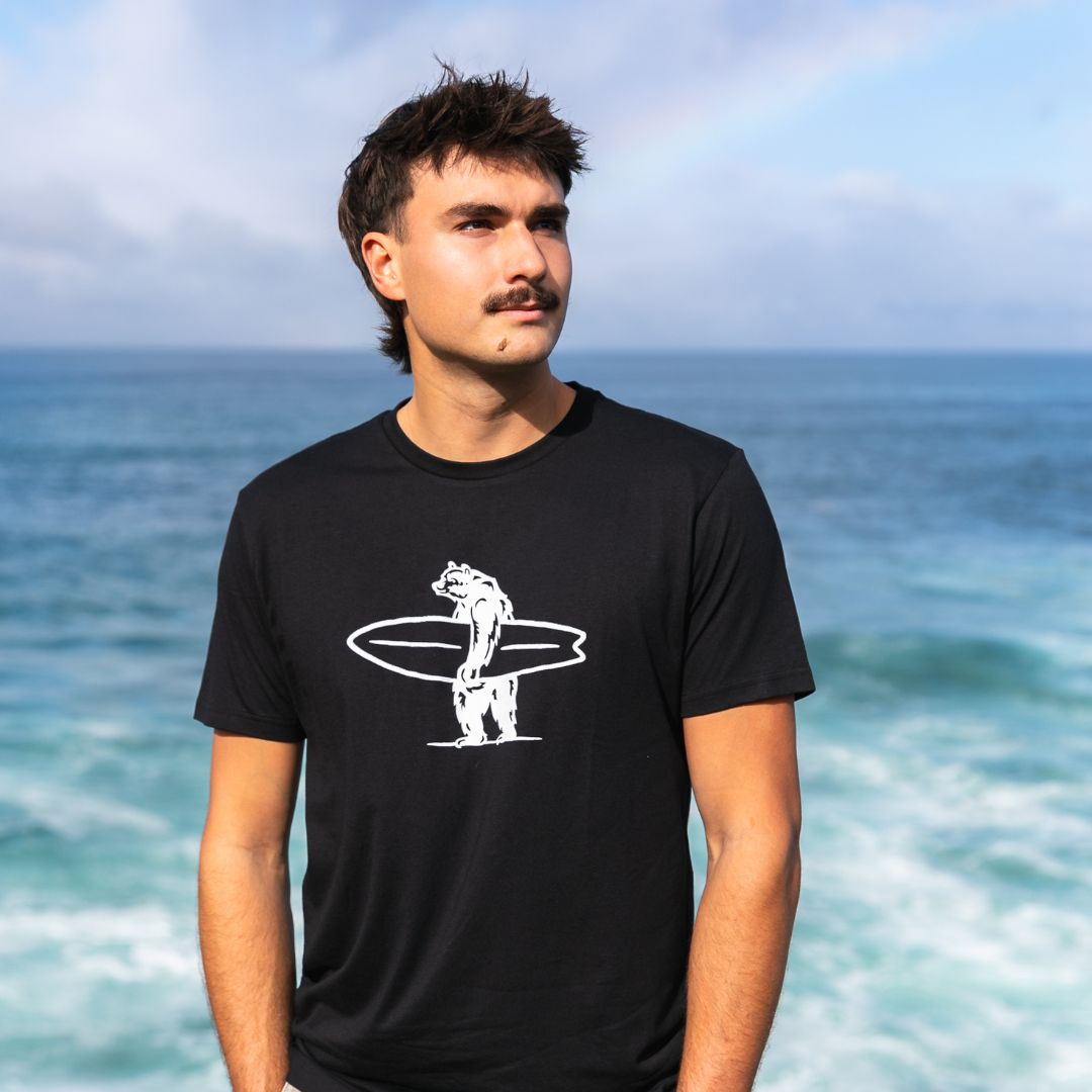 A model wears the Simply Brutus T-Shirt in Black
