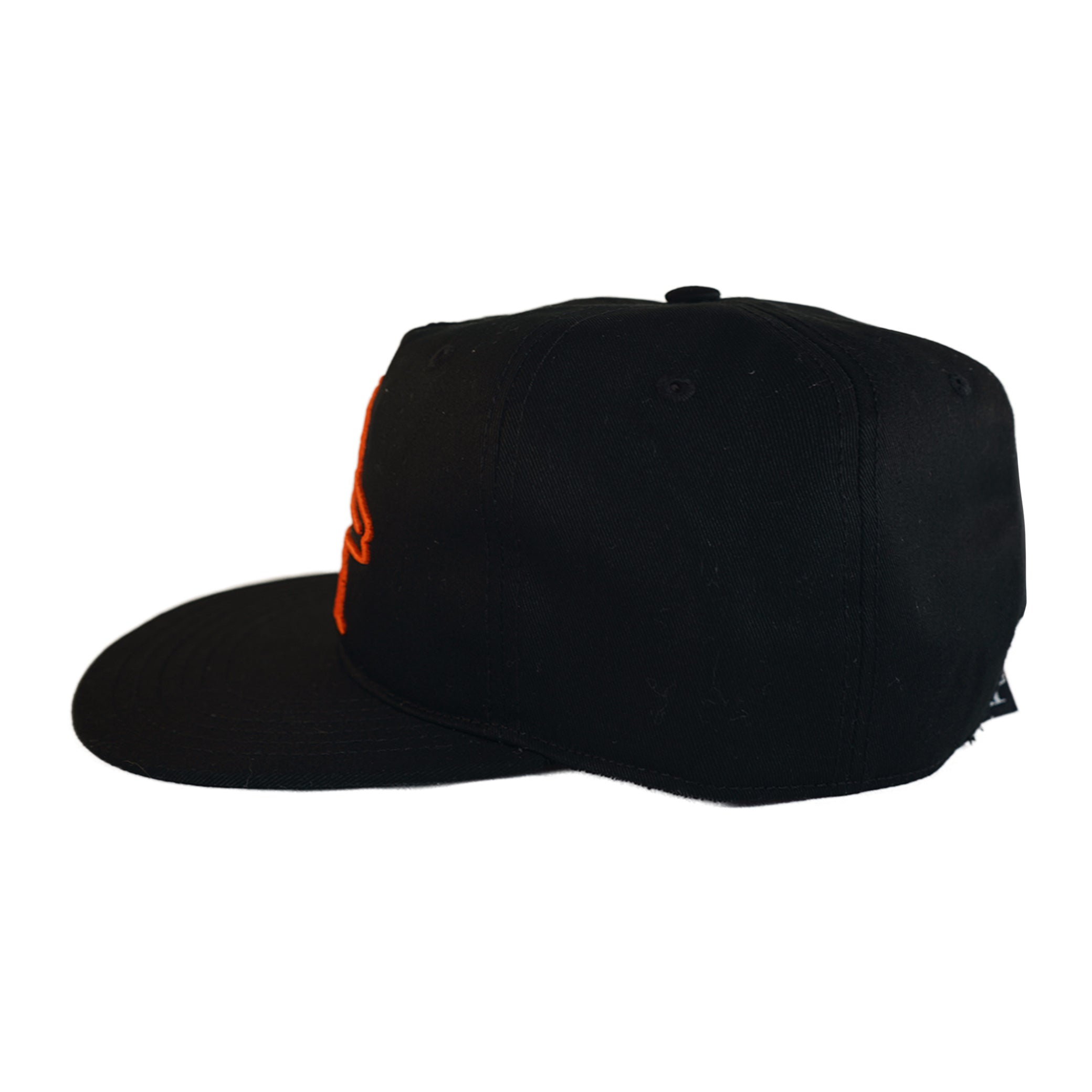 Navy blue cap with perforated design on a white background