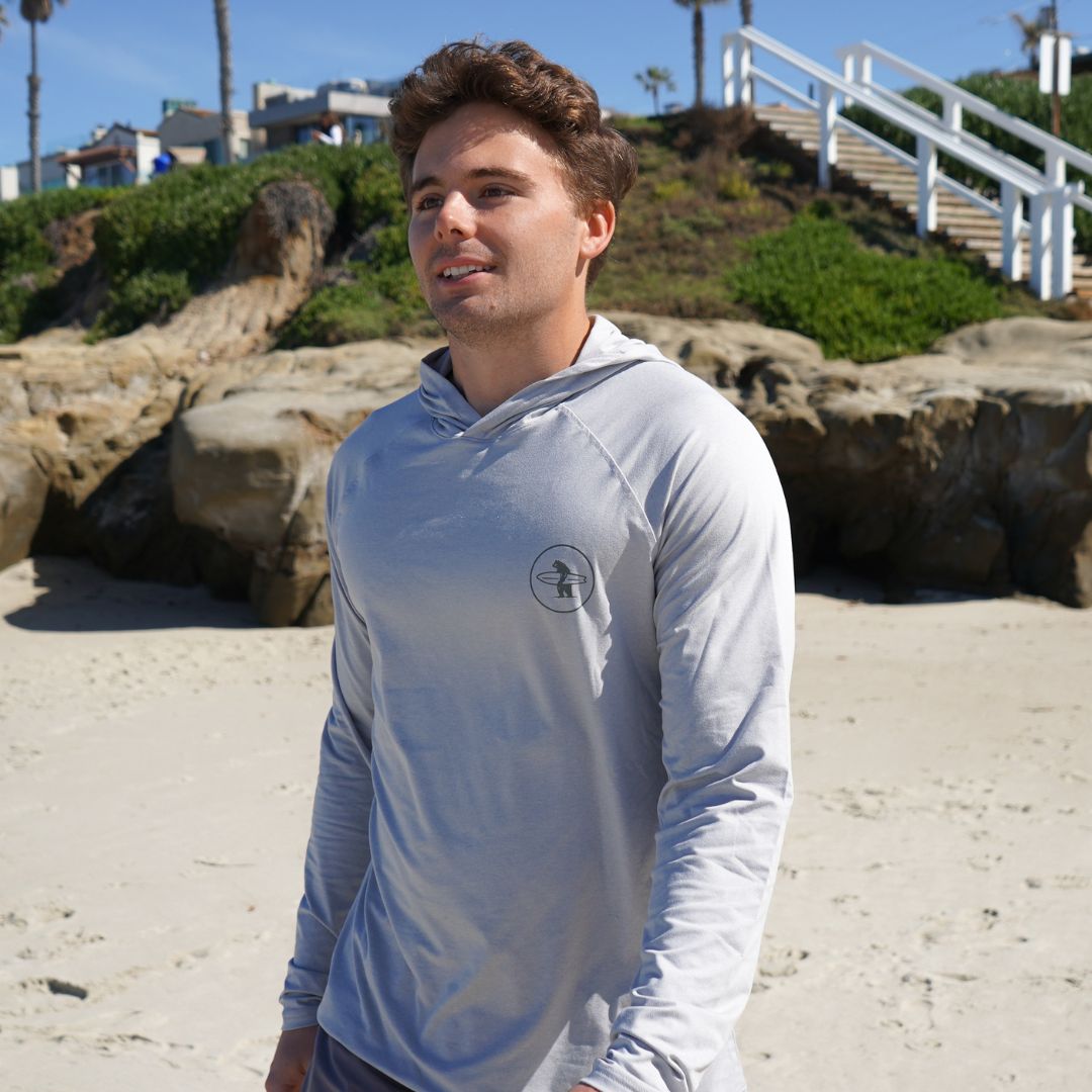 Everyday California model wearing Breaker UPF50 Sand Resistant Hoodie in Grey in La Jolla