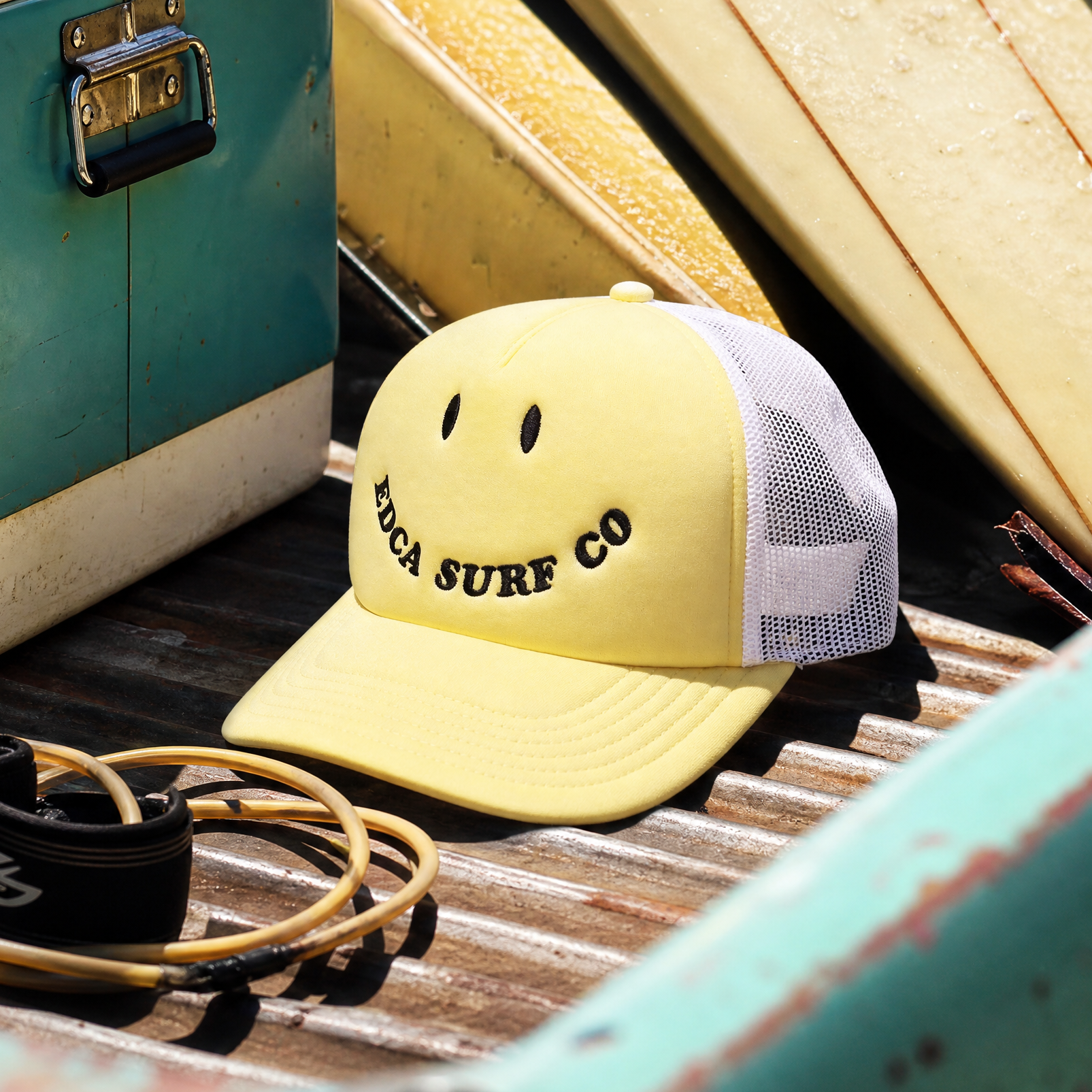 Foam trucker snapback hat in the bed of a pickup truck. 