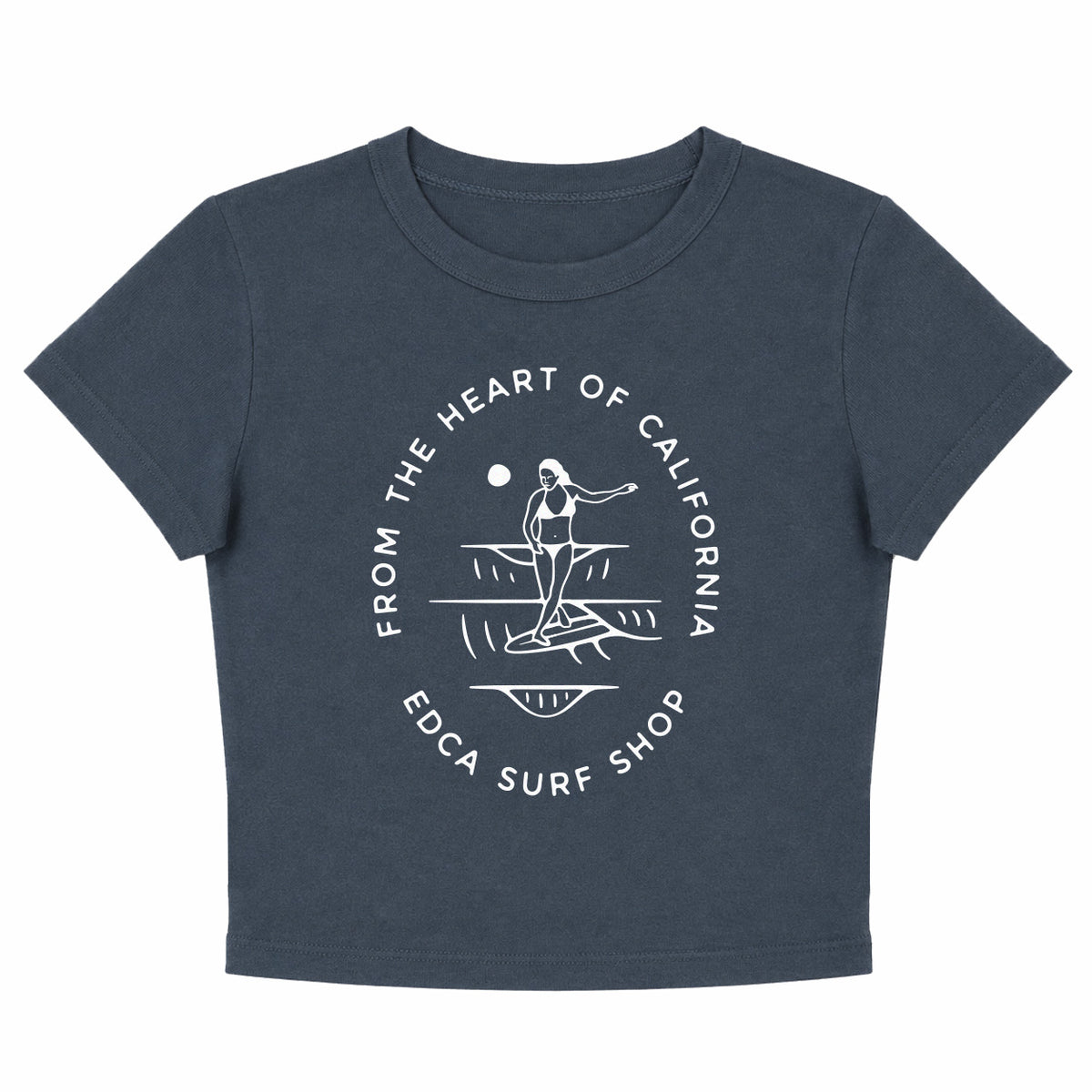 Navy blue womens modest cropped short sleeve t-shirt with a white graphic of a woman surfer on the front chest of the shirt, with words that say "From the Heart of California, EDCA Surf Shop" encircling the design. 