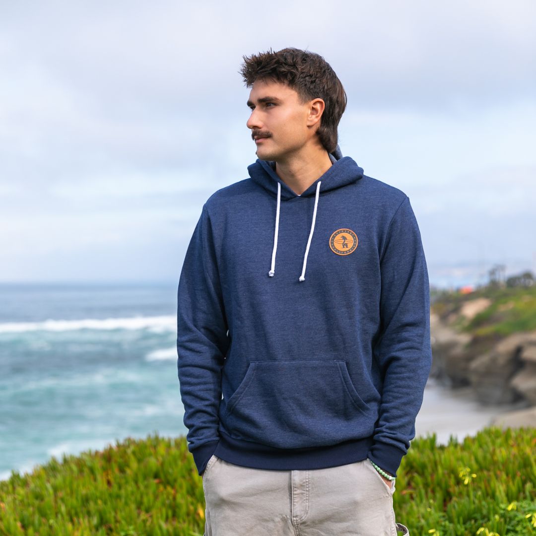 The Challenger Hoodie in Navy from everyday California. It is the soft, not too thick, but still keeps you warm on a breezy Beachy day.