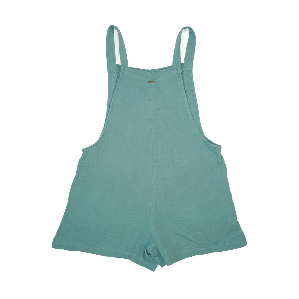 Green romper with thin straps on a white background