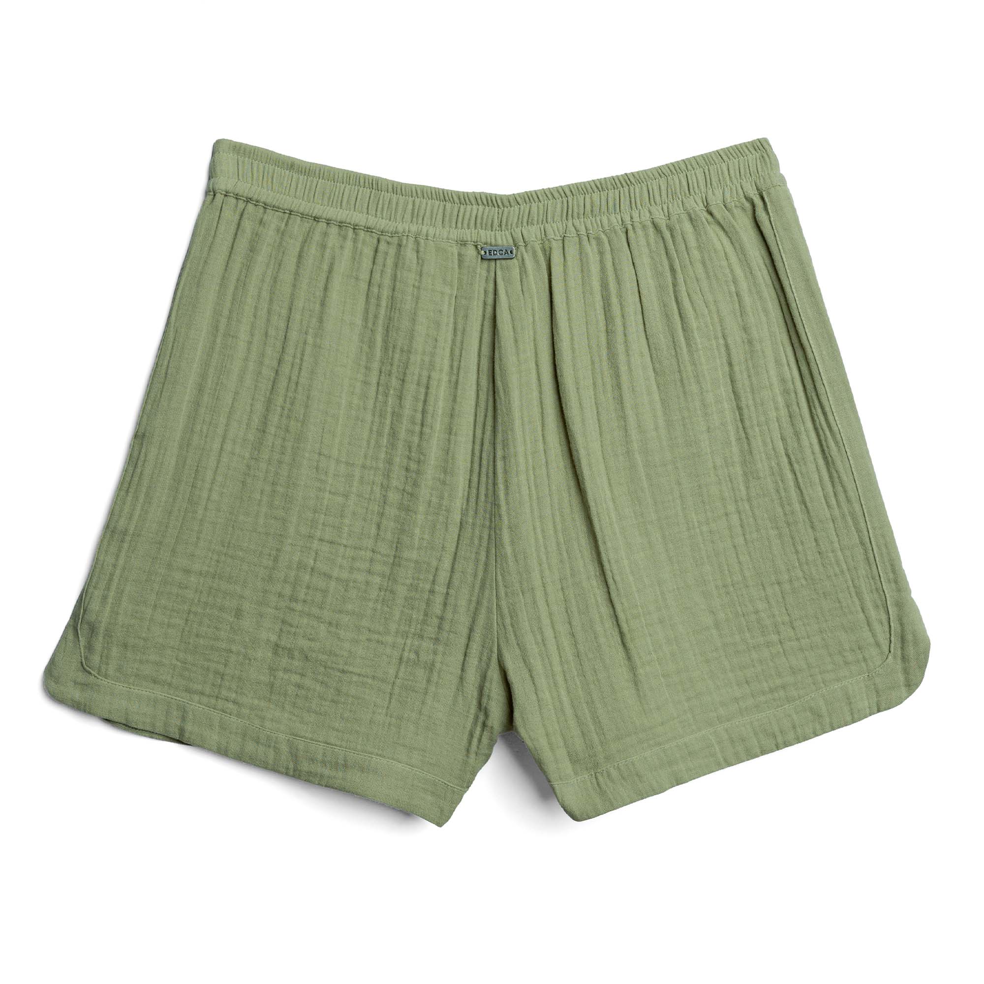 Green gauze shorts on a white background