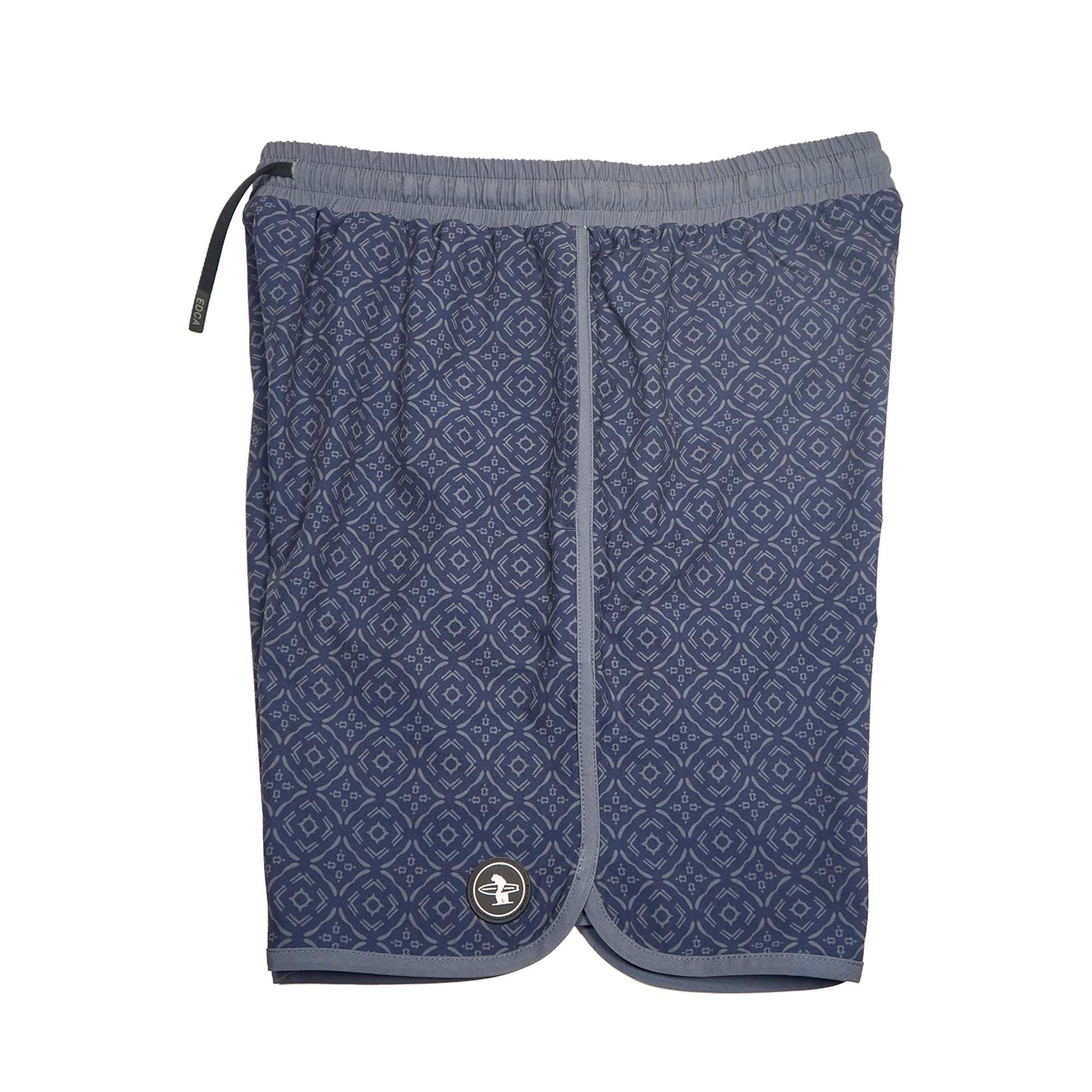 Everyday California navy blue patterned boardshorts with a brand logo on a white background