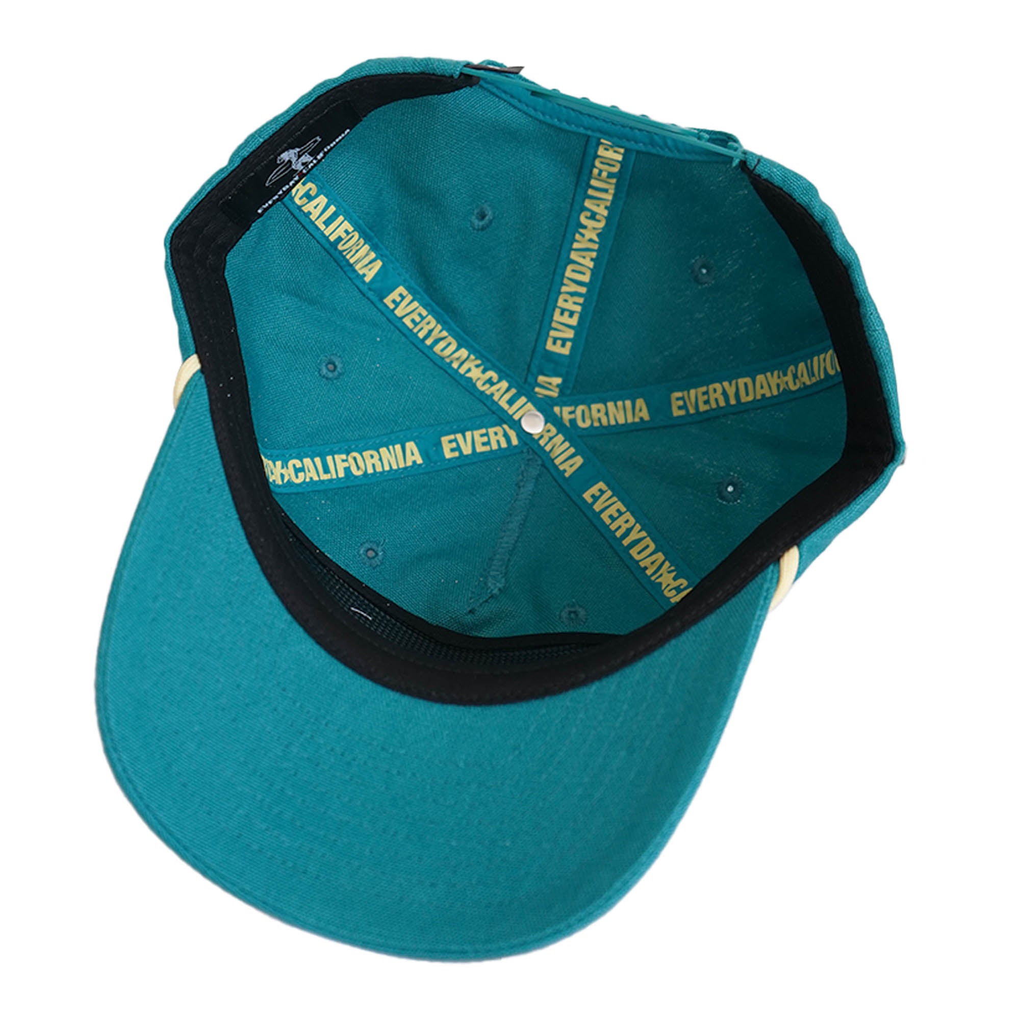 Interior of teal snapback showing "Everyday California" branded tape in gold