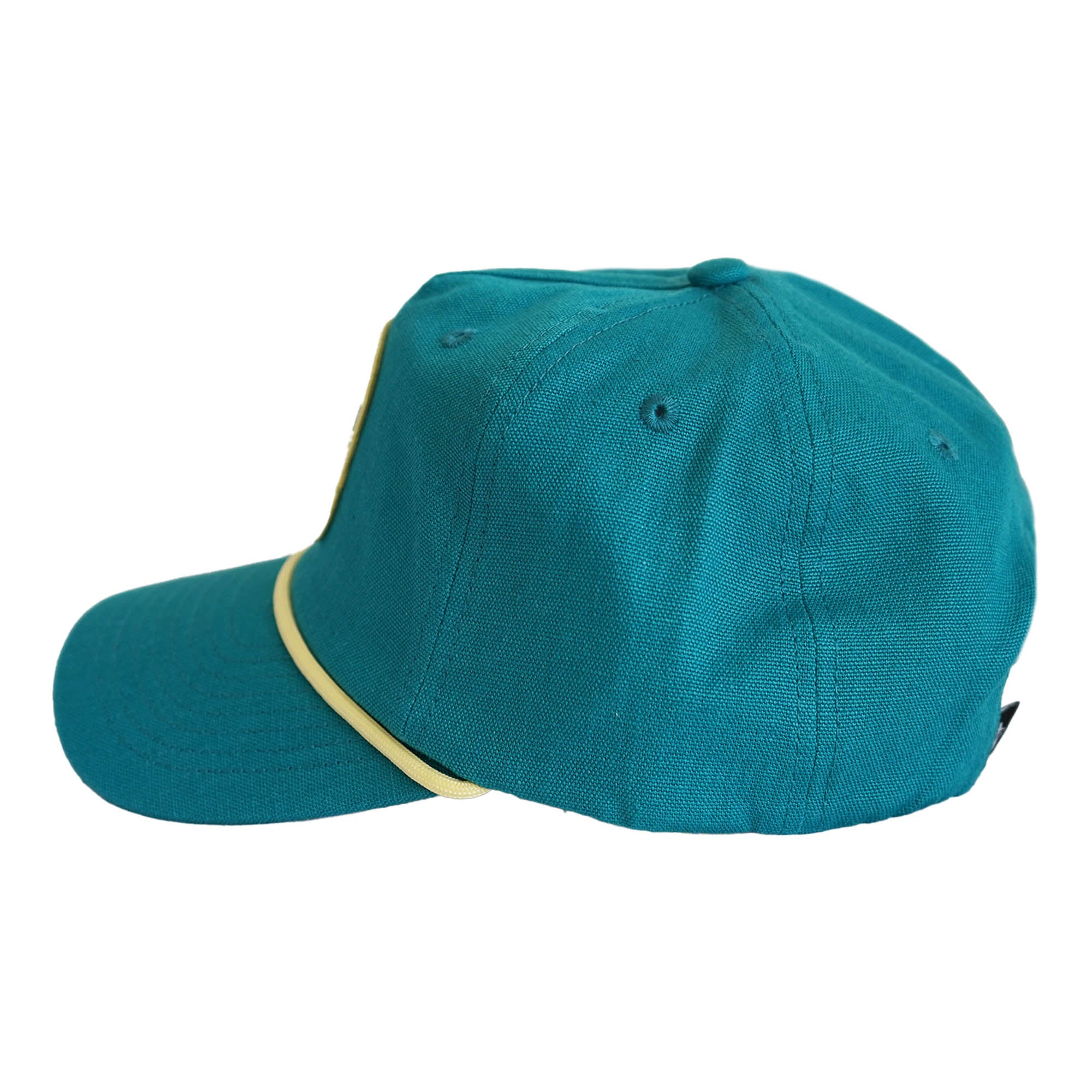 Side profile of teal canvas snapback with cream rope brim detail