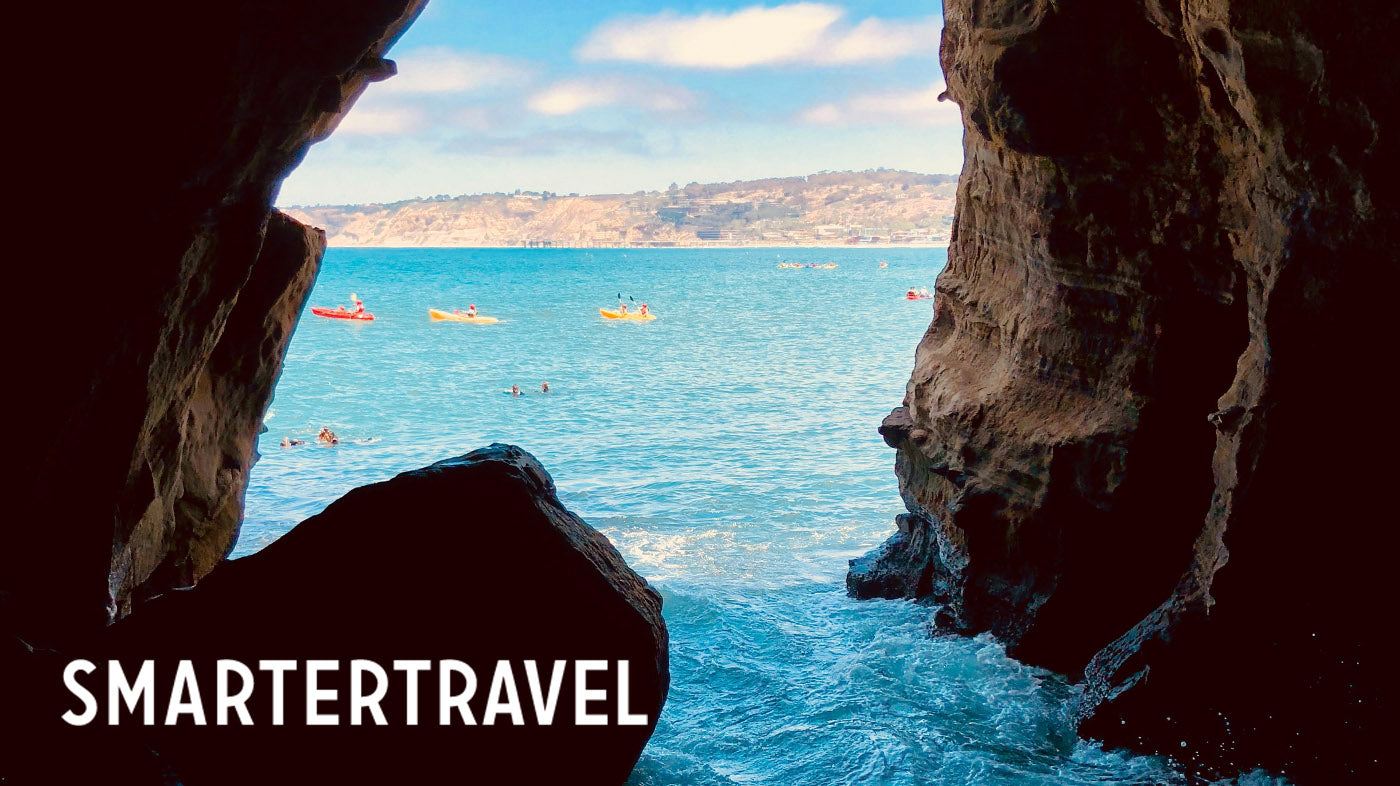 First person point of view photo from inside an ocean sea cave in La Jolla. The photographer is on a kayak