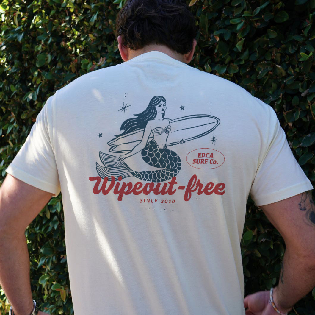 A man facing backwards wearing an Everyday California wipeout tee. 